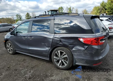 2022 Honda Odyssey Touring z USA, uszkodzony, nr VIN 5FNRL6H83NB027682